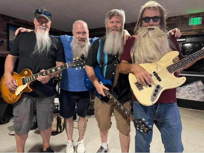 Four Handsome Men with their Instrument