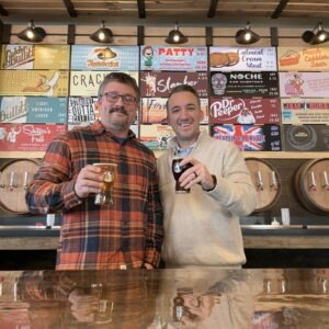 Two Men Holding Beer